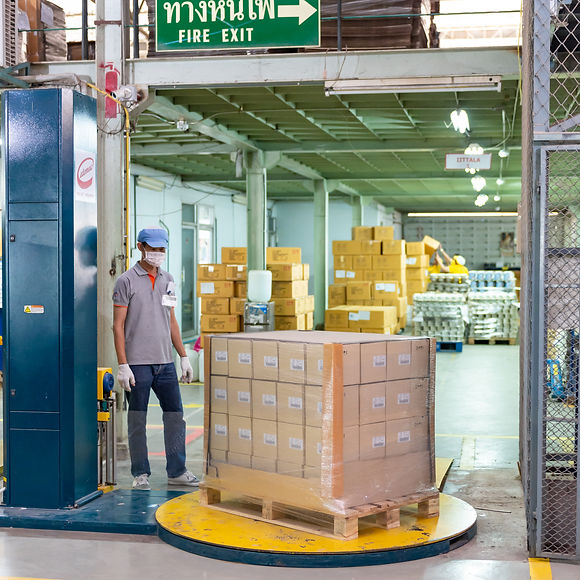 Automated shrink wrapping and packaging facility at Crown Ceramics warehouse