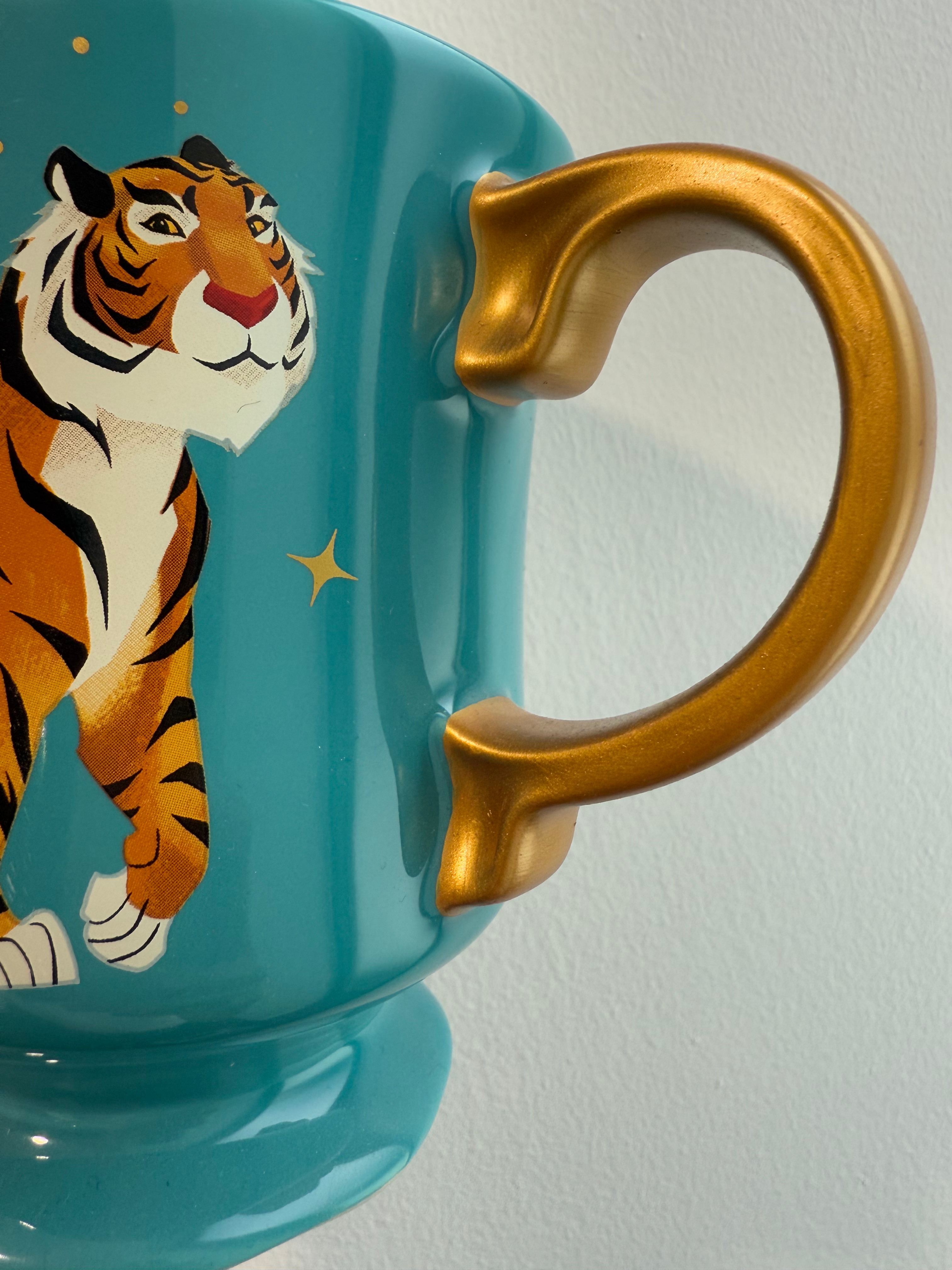 Hand-applied decalcomania artwork on ceramic dinnerware