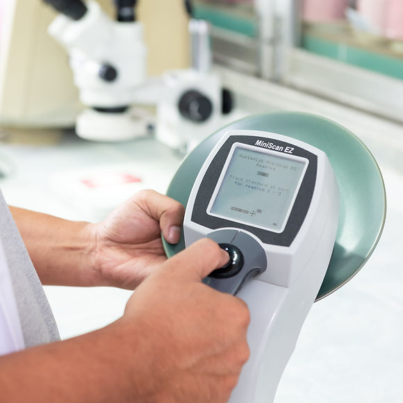 Digital Color Meter Lab measuring glaze shade consistency